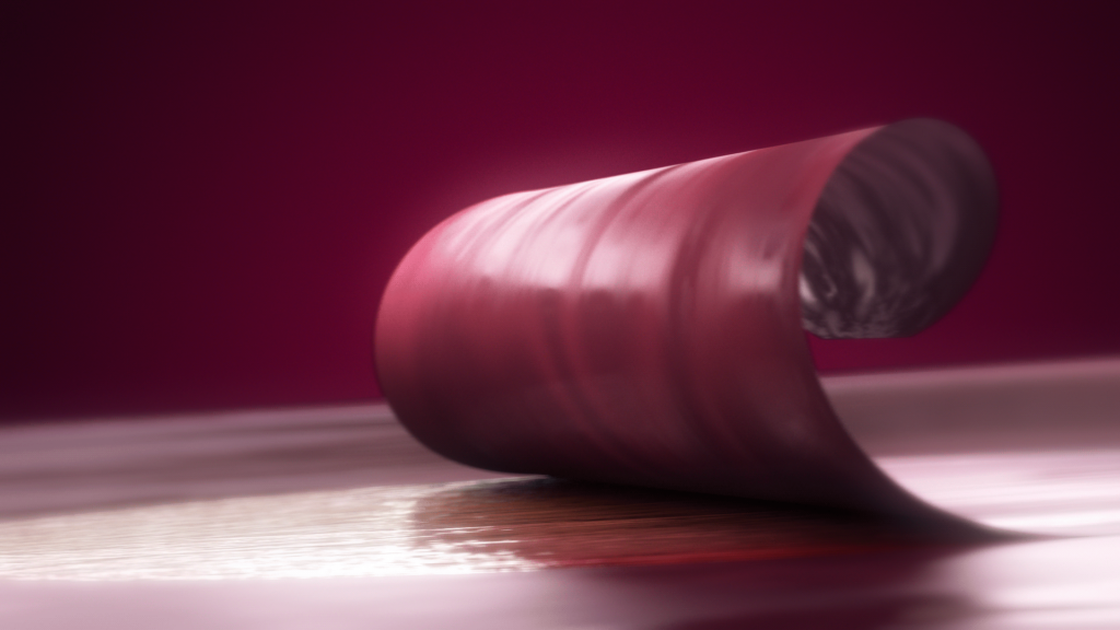 Curled Fruit sheet on reflective surface.